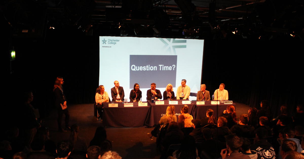Businesses sat down at Panel facing students