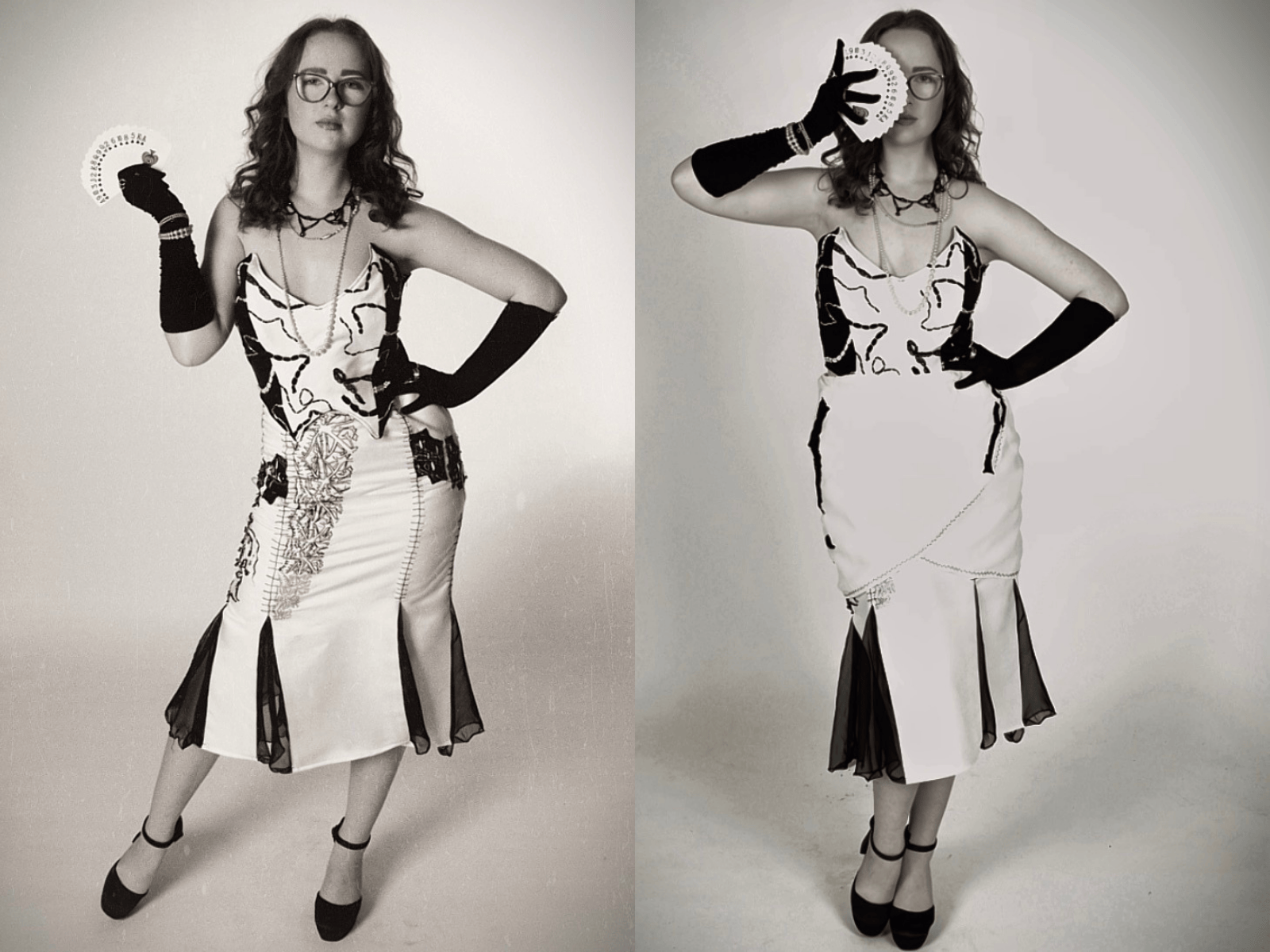 Bethan in her dress showing off her design
