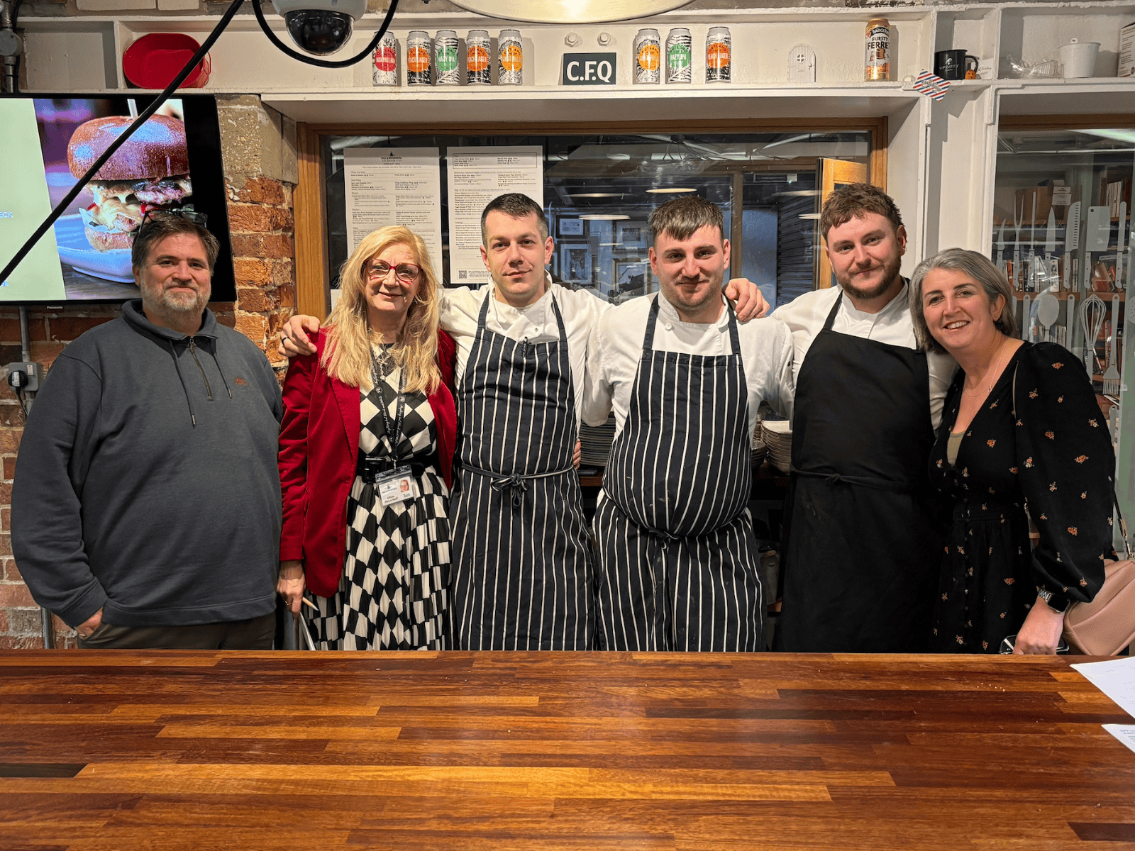 Andrei and Tomaz stood with some Chichester College staff and the judges