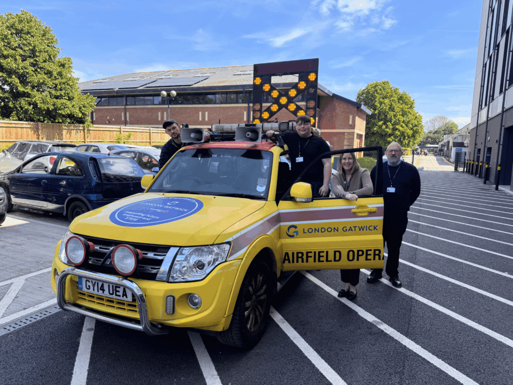 Our Principal stood with lecturers around the new donated vehicle